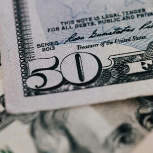 From above closeup of American dollar banknote with signature and printed words above paper money